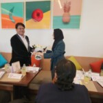 The welcoming of Hon'ble Chairman Shri Jaheer Bukhari by Executive Director Ms. Tehrim Mulla during a round table session of AECCI-IAC.